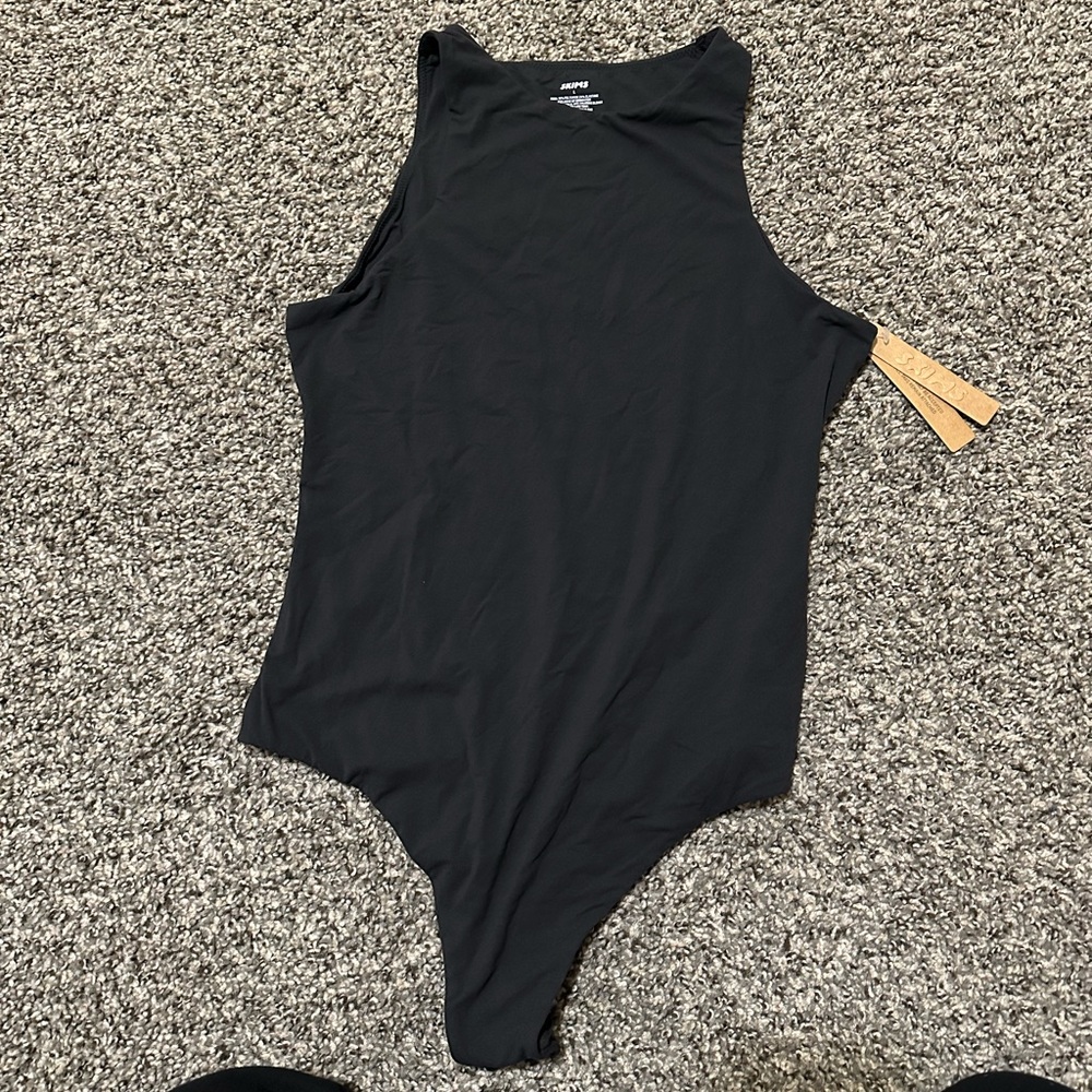 Skims high neck bodysuit color onyx